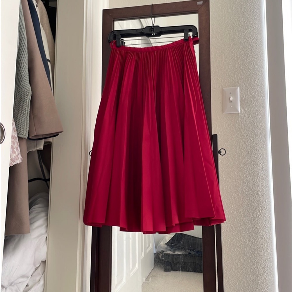 Initial pleated midi skirt